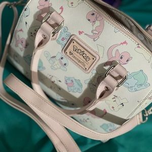 Pokémon pastel loungefly purse. In great condition. Bought it only for show.